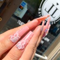 Floral and sparkle nail art design long nails Little Luxuries Nail Lounge