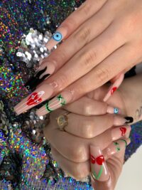 Nail art featuring multiple small designs from Little Luxuries Nail Lounge