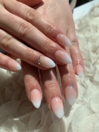 ombre french manicure nail art design with gemstone accents from Little Luxuries Nail Lounge